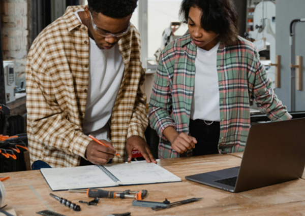 Two Workers In Workshop